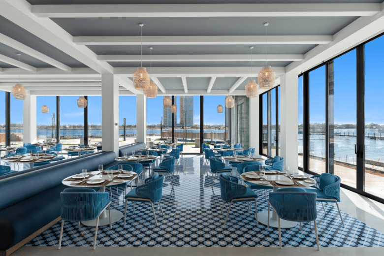 Seaside restaurant at Rixos Obhur Jeddah offering panoramic views and Mediterranean decor