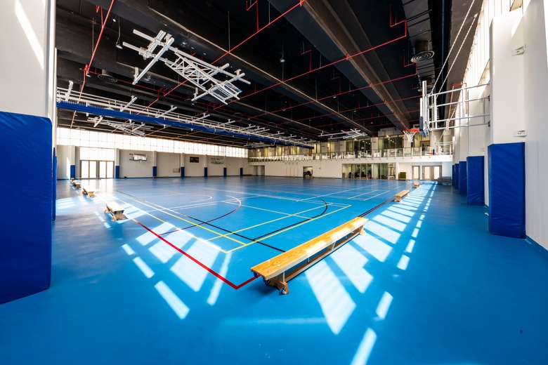 Sports facilities at BISR Al Waha including climbing walls and gym