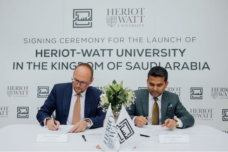Officials from Almasar Alshamil Education and Heriot-Watt University during partnership signing ceremony in London