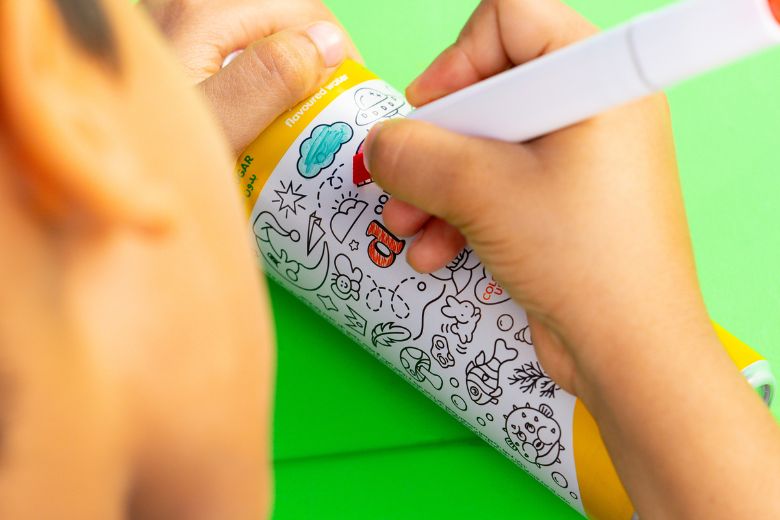 Creative doodle-ready packaging of Oodles of Doodles drinks