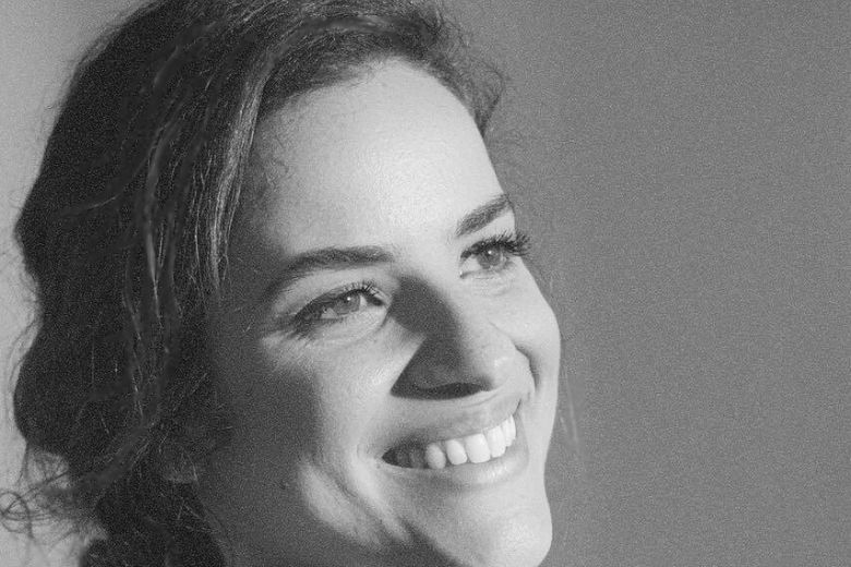 Working mother reflecting on leadership and career sustainability