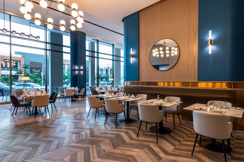 Al Basatin Restaurant dining area at Crowne Plaza Al Jubail