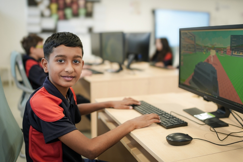 Students using digital technology in the Digital Learning Ecosystem at King's College Riyadh