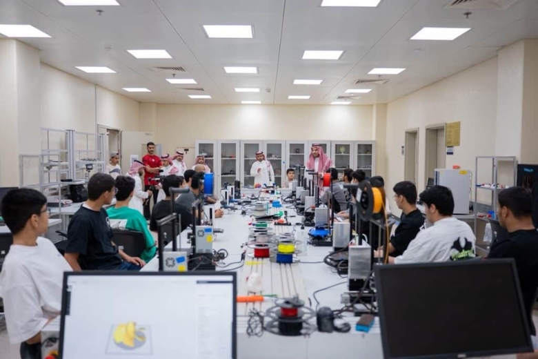 Qassim University summer club students taking part in educational activities