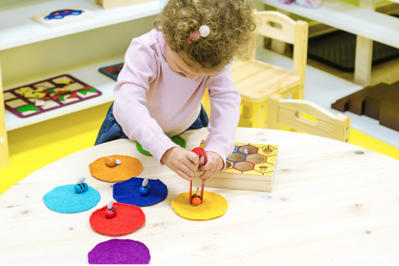 Children build practical skills and independence through meaningful Montessori activities at Sunrise Montessori Nursery Riyadh.