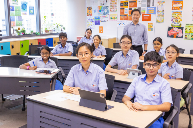 Students engage in a classroom discussion, comparing ideas and learning to explain their thinking with confidence