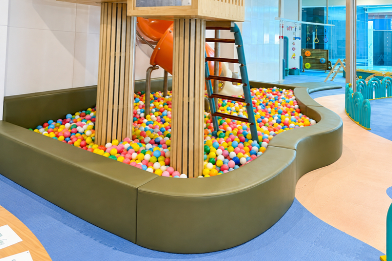 Playdate provides younger children with a dedicated indoor play environment while parents can relax nearby
